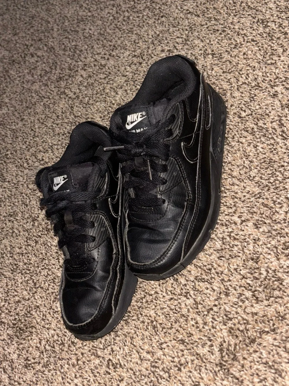 Nike Kids Black Low-Top Sneaker with Subtle Swoosh